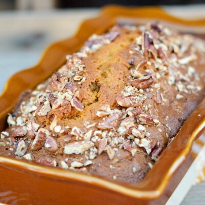 A seriously Easy Pumpkin Nut Bread recipe that you can whip up in ONE BOWL in just minutes! Your friends will be begging you for this recipe!