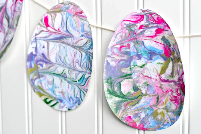 These Shaving Cream Painted Easter Eggs are such a fun and easy sensory Easter Craft for the kiddos!