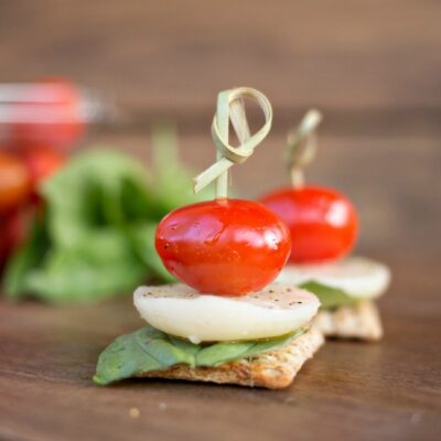 Caprese Triscuit Snacks - mozzarella, basil and tomato stacked up high on your favorite Triscuit cracker! The perfect snack!