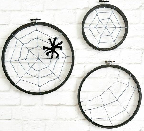 These Spooky Spider Web Hoops are adorable and easy to make with craft supplies you might just have on hand!
