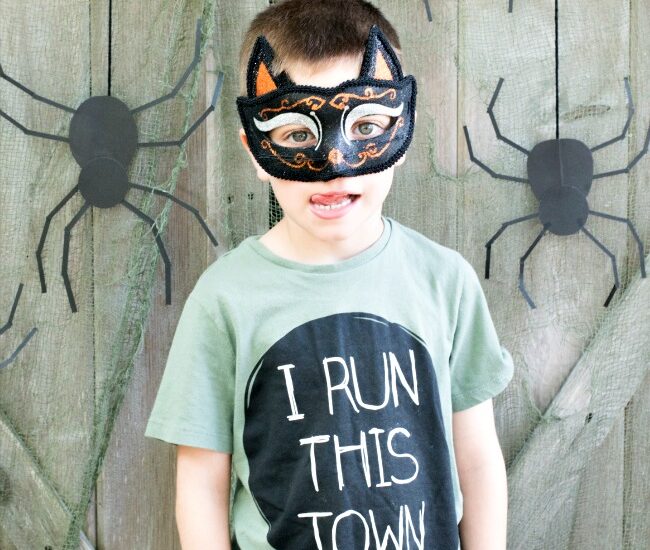 This Halloween, create a DIY Halloween Photo Backdrop for less than $5 to capture all those fun costumes and moments!