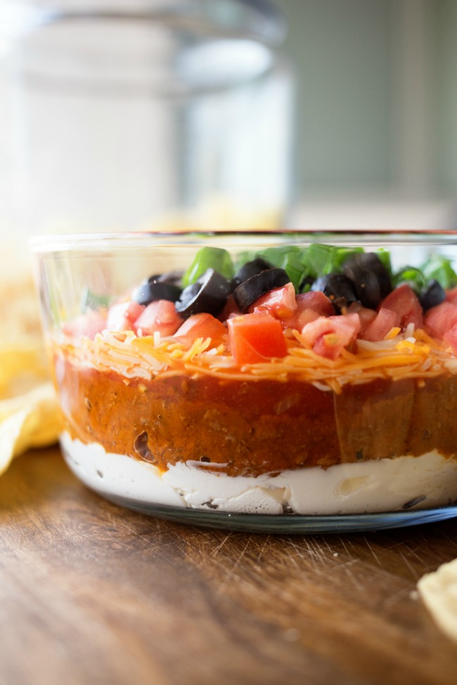A fun twist on the classic dish, this Chili Cheese 7 Layer Dip is easy to whip up and a real crowd-pleaser!