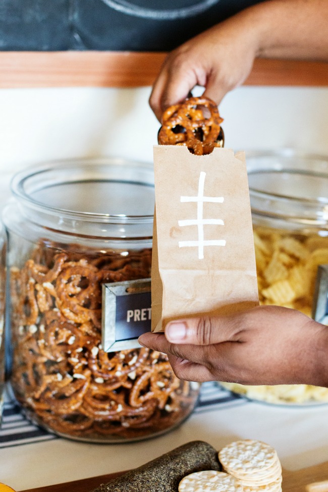 With this Self-Serve Game Day Snack Bar, your guests can fill up baggies with their favorite snacks!