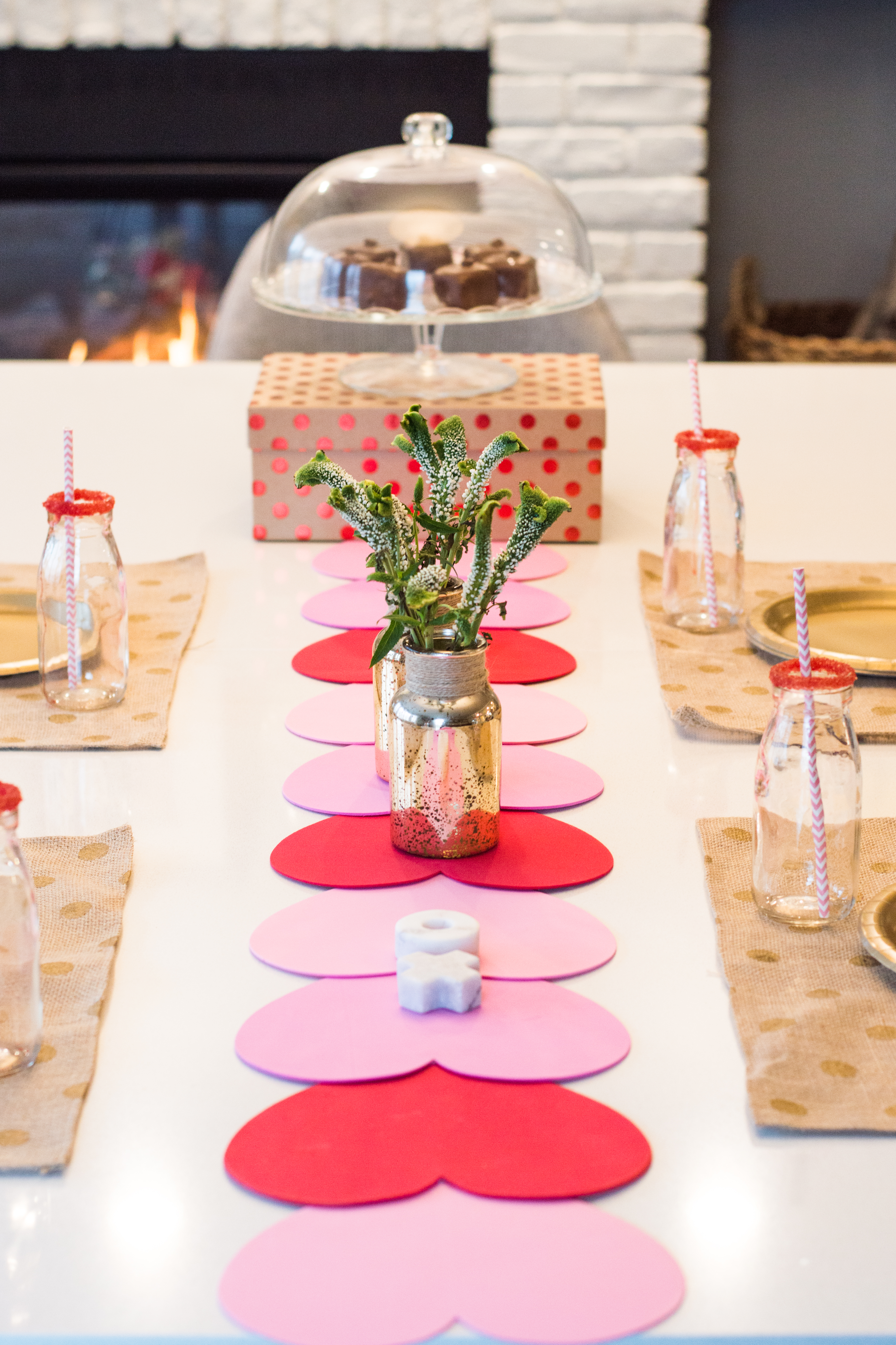This Valentines DIY Table Runner is a simple way to bring Valentine's to your house, or a kid's party.