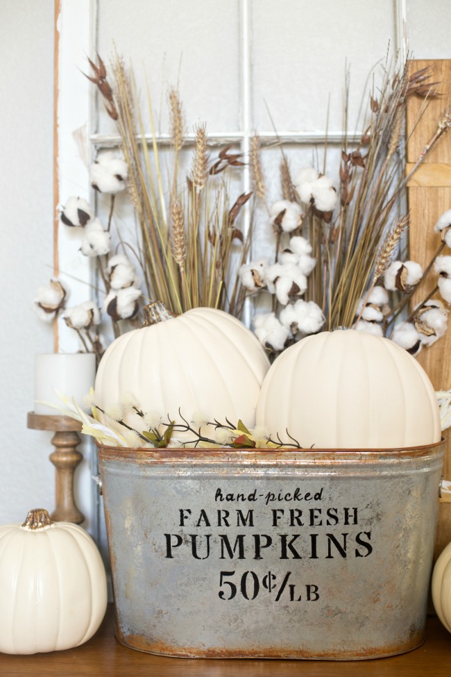 There's nothing better than the farmhouse look for Fall! Make your own DIY Farmhouse Pumpkin Bucket in just a few easy steps!