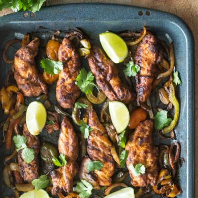 These Fire Grilled Sheet Pan Fajitas are packed full of flavor and are ready in just 20 minutes!