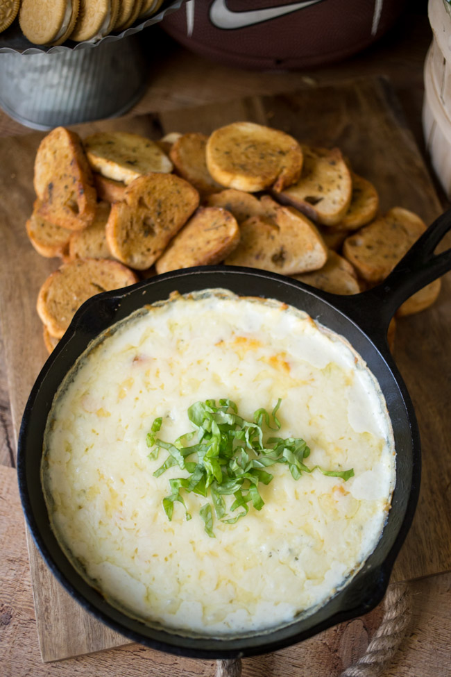 This White Pizza Dip is easy to whip up and so delicious! It will be the hit of any party. 