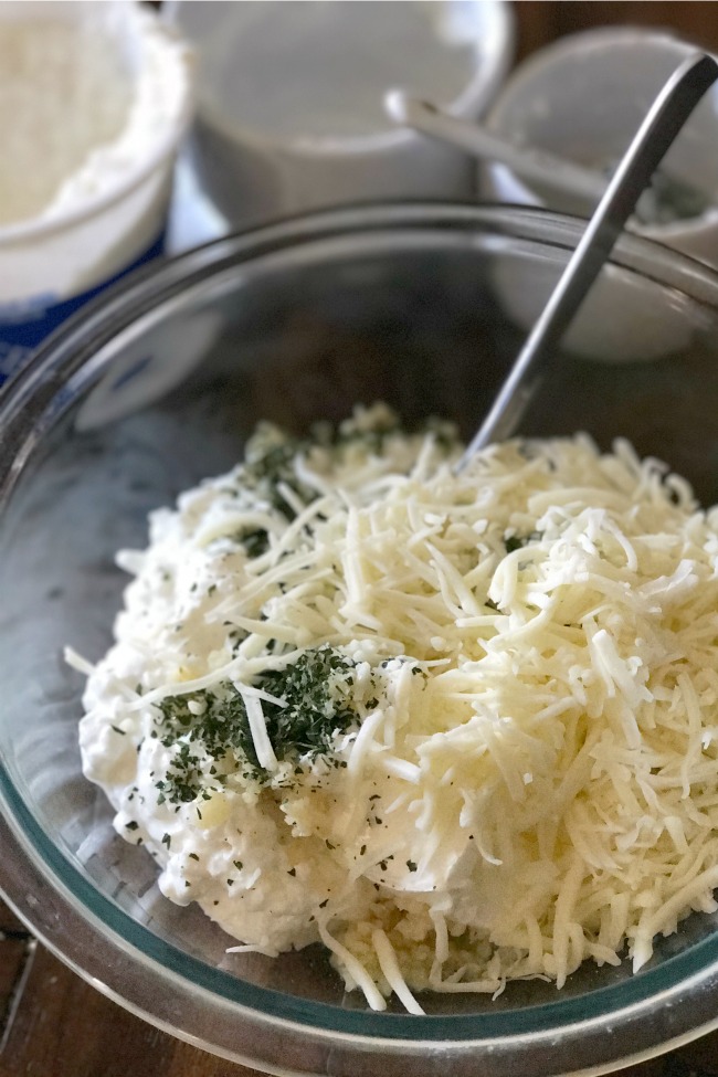 This White Pizza Dip is easy to whip up and so delicious! It will be the hit of any party. 