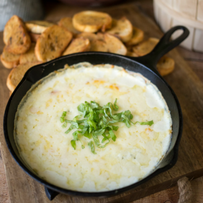 This White Pizza Dip is easy to whip up and so delicious! It will be the hit of any party.