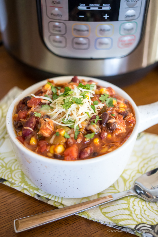 Instant Pot Turkey Chili is a quick and easy meal that you can make with leftover holiday turkey or ground turkey - an easy weeknight meal that your family is sure to love! #InstantPot #ChiliRecipe