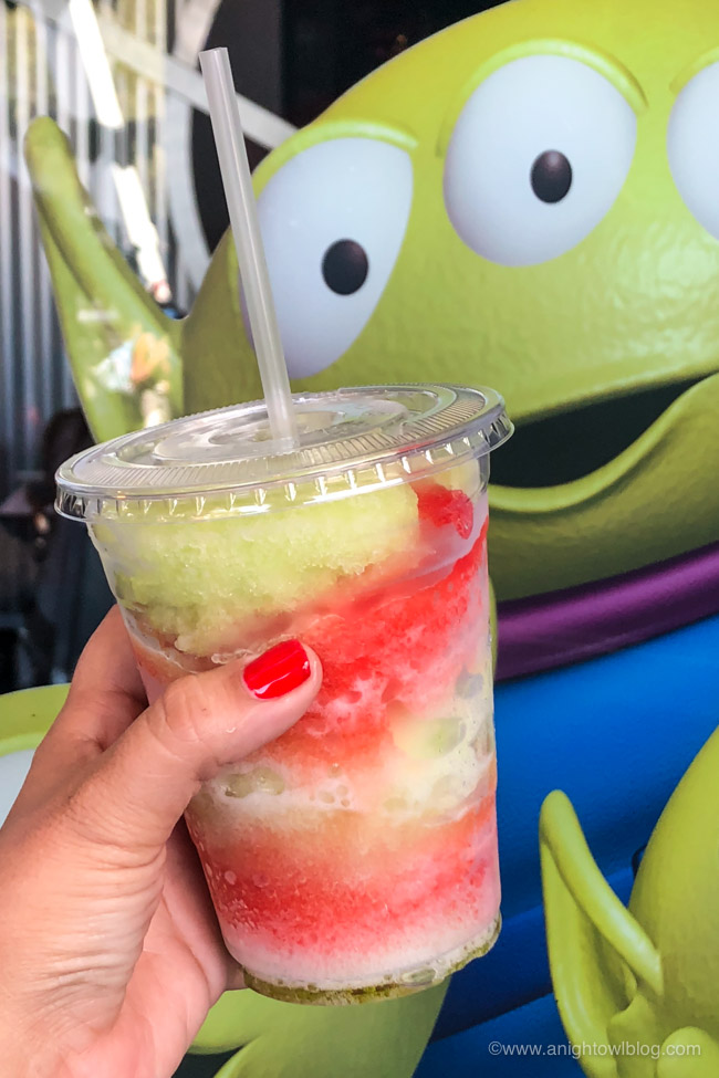 Strawberry and Sour Apple Slushes from Slice Alien Pizza Planet, Disneyland Park, Tomorrowland | From Cheeseburger Pizza from Alien Pizza Planet to the Toy Story Root Beer Float in a Souvenir Boot, check out our picks for The BEST Disneyland Pixar Fest Food finds! #Disneyland #PixarFest