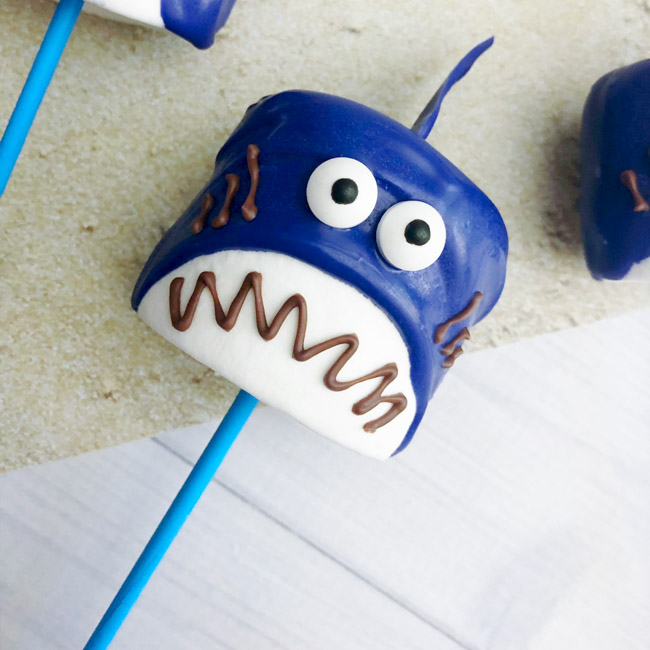 These Shark Marshmallow Pops are easy, tasty and fun! The perfect #SharkWeek or shark party treat for the kids or shark lover in your life!