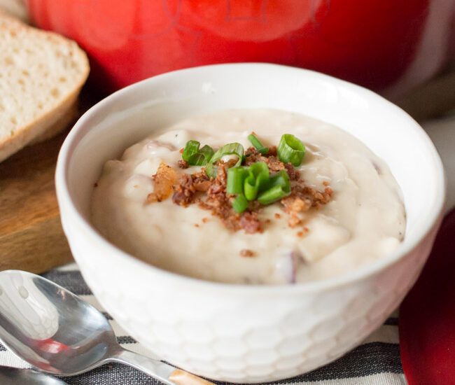 Made with yummy bacon and white cheddar, you're going to relive your Epcot Canada Pavilion days with this popular Disney Recipe: Le Cellier Canadian Cheddar Cheese Soup!