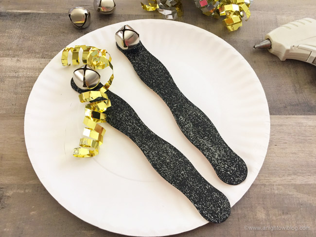 A perfect craft for kids leading up to New Year's, create your very own DIY New Year's Eve Noise Makers to ring in the New Year in DIY style!