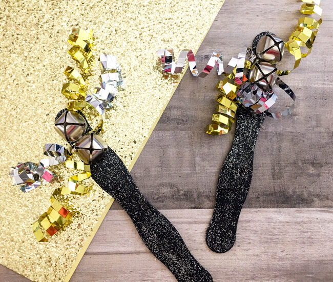 A perfect craft for kids leading up to New Year's, create your very own DIY New Year's Eve Noise Makers to ring in the New Year in DIY style!