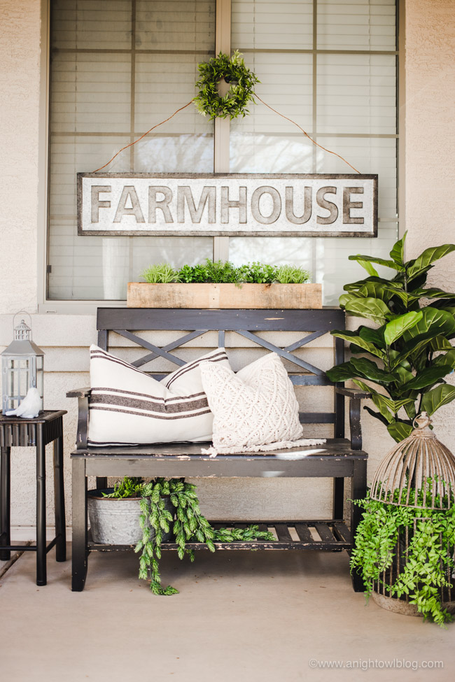 This year, create an easy Spring Farmhouse Porch with lifelike greenery, farmhouse signs and plenty of rustic elements and charm.