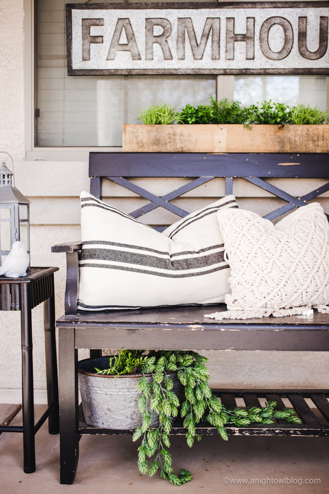 This year, create an easy Spring Farmhouse Porch with lifelike greenery, farmhouse signs and plenty of rustic elements and charm.