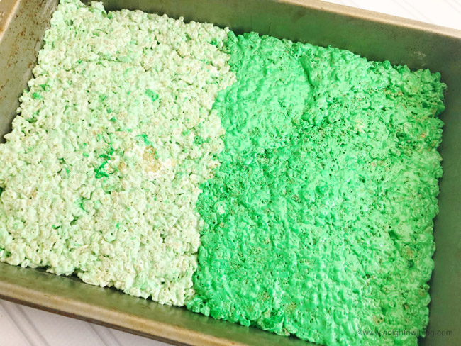 The perfect St. Patrick's Day snack, whip up these easy and adorable Green Shamrock Rice Krispie Treats!