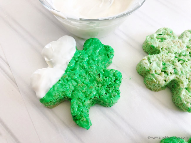 The perfect St. Patrick's Day snack, whip up these easy and adorable Green Shamrock Rice Krispie Treats!