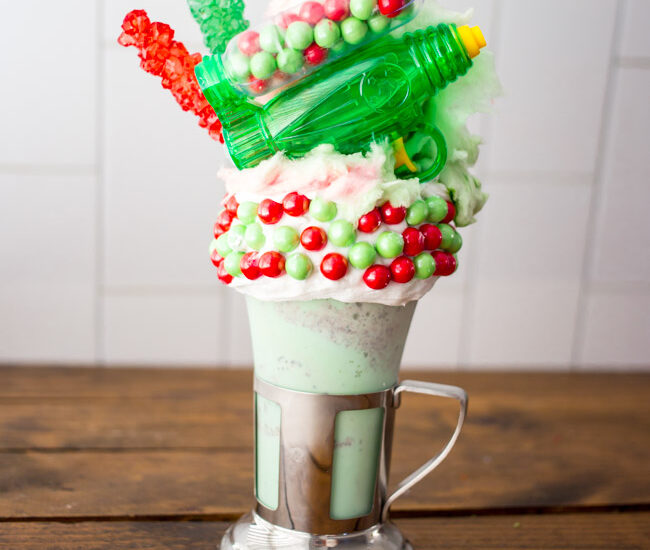 Inspired by Black Tap Freakshakes, whip up this fun Star Wars Boba Fett Freakshake, perfect for Mandalorian fans!