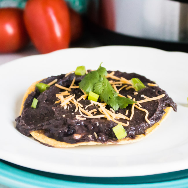 No soaking needed! Whip up delicious Instant Pot Refried Black Beans in a fraction of the time without skimping on the homemade taste!