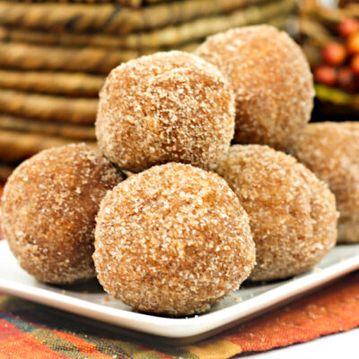 The perfect breakfast or snack for fall, these Easy Baked Pumpkin Donut Holes pair perfectly with your PSL or warm apple cider!