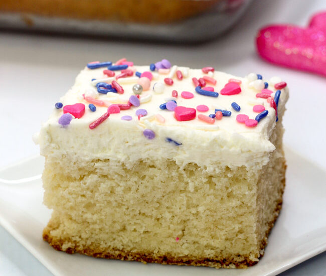 Perfect for Valentine's Day, this White Texas Sheet Cake is fun, festive and delicious!